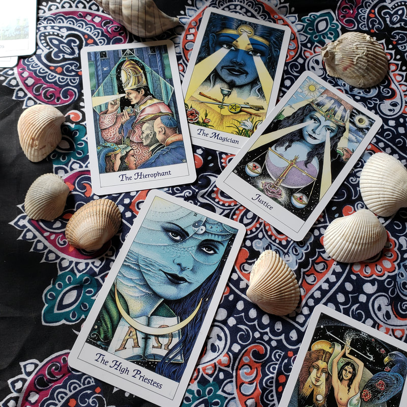 The Magician, High Priestess, Justice, Hierophant. Cosmic Tarot